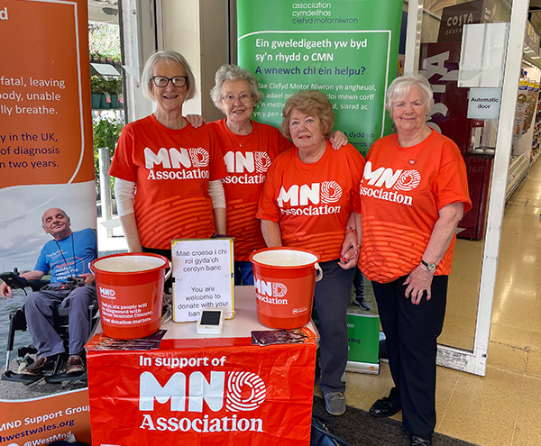 North West Wales MND four Volunteers at Tesco Caernarfon with bucket buckets