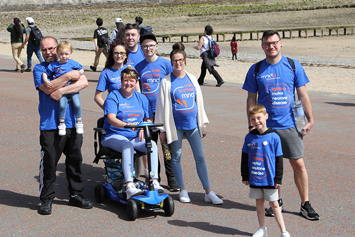 a family taking part in walk to d'feet MND